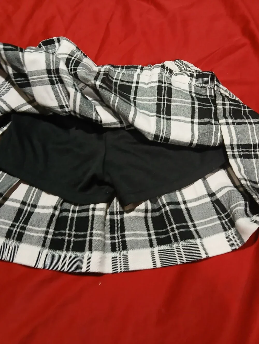 Justice Black and White Plaid Pleated Skirt with Side Ribbon Detail